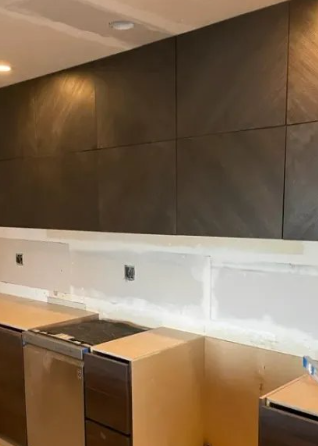 Kitchen mid-build with cabinet boxes set